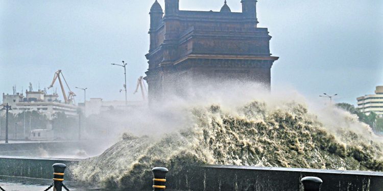 Videos of large waves crashing on the Gateway of India goes viral.