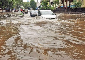 Heavy rain in parts of Mumbai, local train service hit.