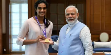 Prime Minister Narendra Modi keeps his word and enjoys ice cream with PV Sindhu.