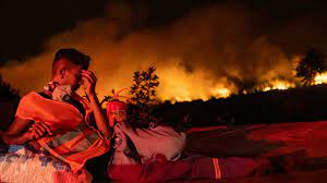 Greek’s second largest island gets engulfed by fire, residents urged to flee.