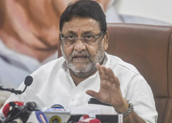 ‘Tell us who your father is,’ says Nawab Malik in his latest assault on NCB’s Sameer Wankhede