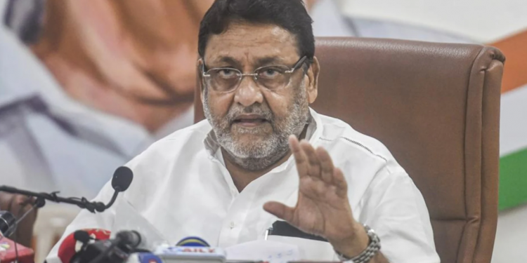 ‘Tell us who your father is,’ says Nawab Malik in his latest assault on NCB’s Sameer Wankhede