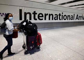 The center sets standards for international newcomers, requiring a negative RT-PCR test