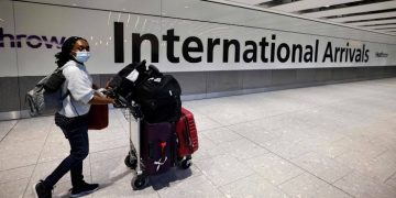 The center sets standards for international newcomers, requiring a negative RT-PCR test